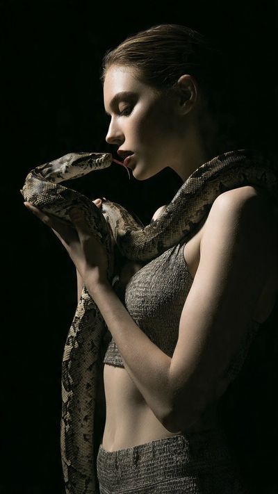 The Serpent’s Gaze: A Portrait of Intrigue