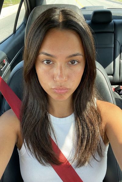 Sunlit Elegance: A Modern Selfie Portrait