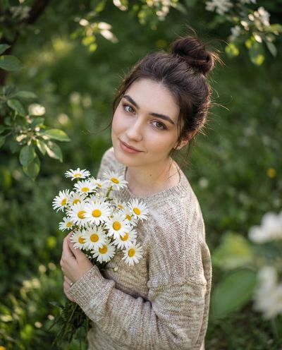 Nature's Elegance: A Young Woman in Full Bloom
