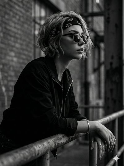 Urban Elegance: A Gritty Portrait in Monochrome