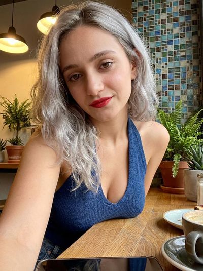 Café Charm: A Playful Selfie Moment