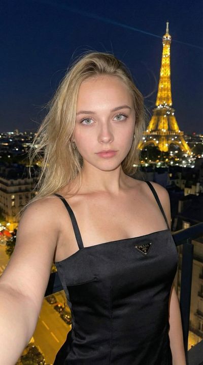 Midnight Elegance: Prada Minimalism on a Paris Balcony