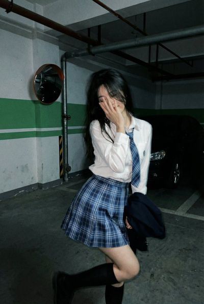 Candid Elegance: A Playful Encounter in Shadows