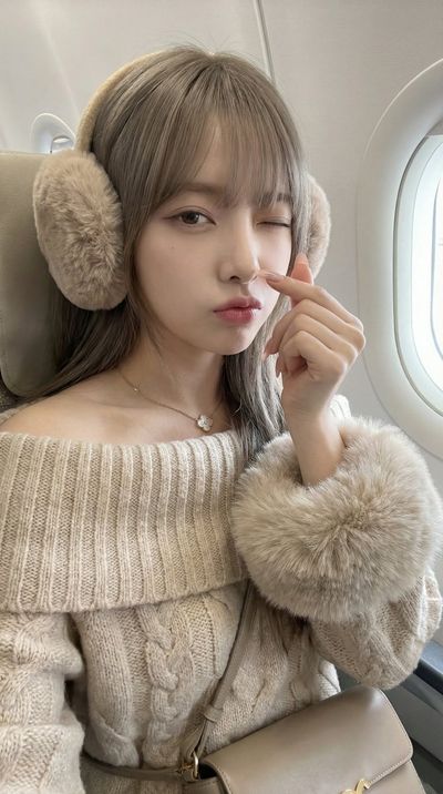 Charming In-Flight Selfie: A Cozy Moment