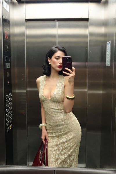 Reflections of Elegance in a Modern Elevator