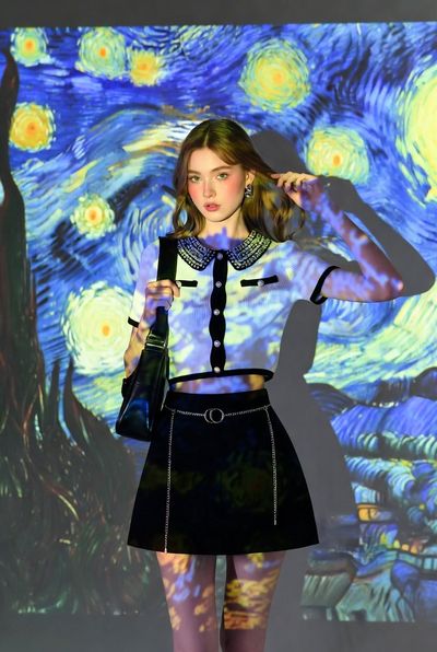 Chic Meets Art: A Modern Muse in Van Gogh's Light