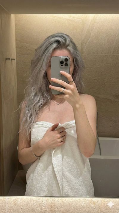 Reflective Radiance: A Bathroom Selfie Story