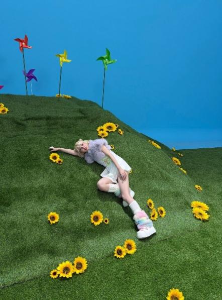 Artificial Grass Hill Sunflower Color Pinwheel Playful Lying Girl Portrait